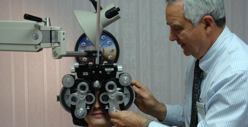 woman taking an eye exam